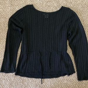 Knit black sweater, light weight and tightens at the waist